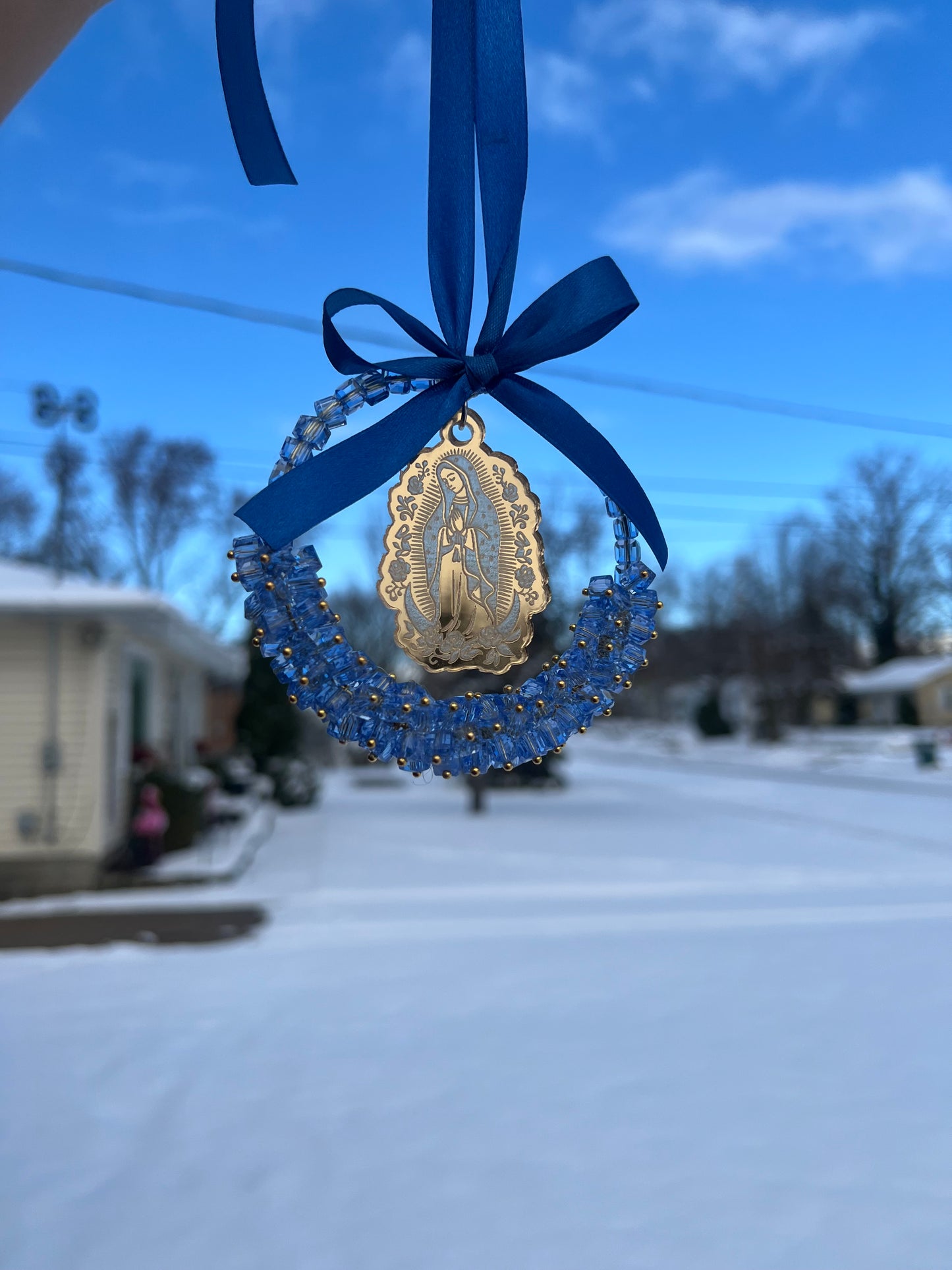 Blue car charm with gold virgencita