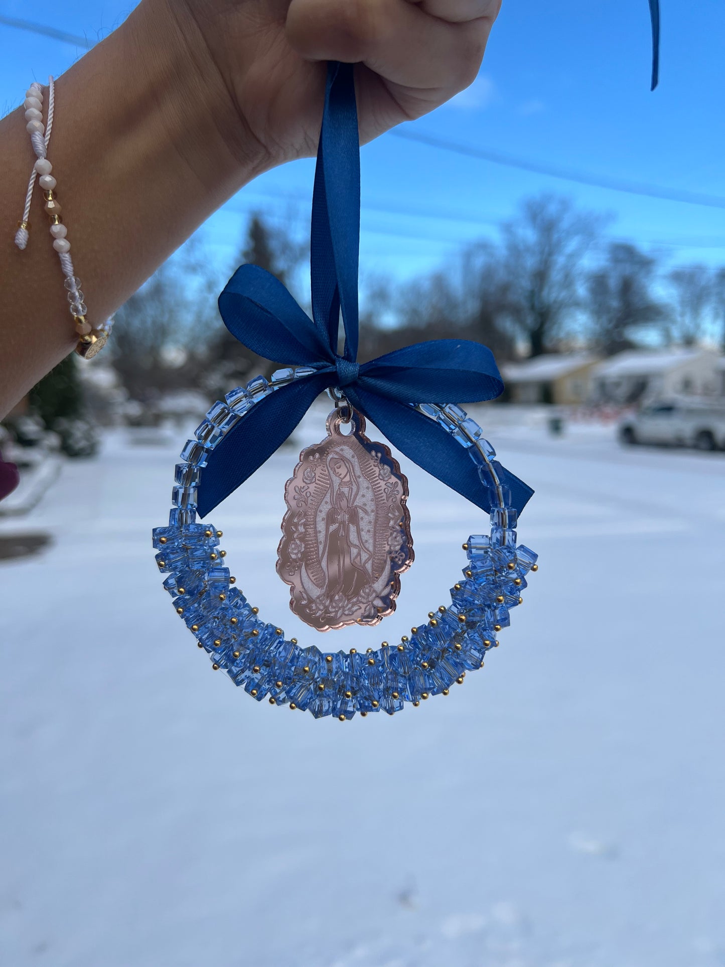 Blue car charm with pink virgencita