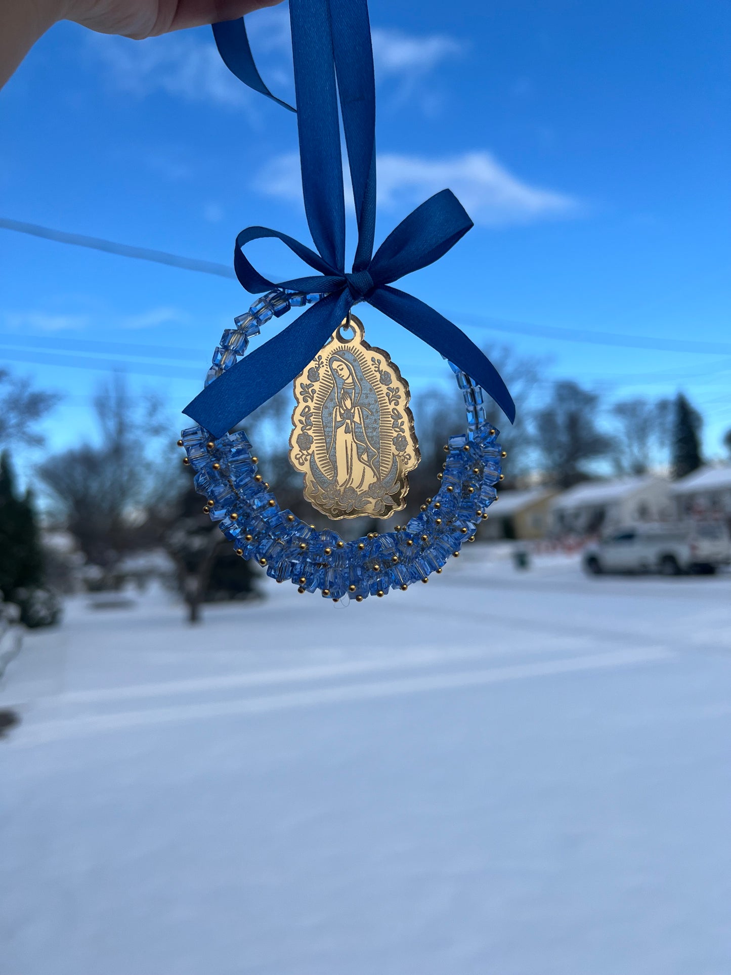 Blue car charm with gold virgencita